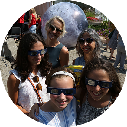 Thousands view a partial eclipse of the Sun at the Dunlap’s eclipse viewing event at the Canadian National Exhibition.