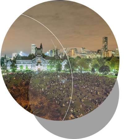 Thousands pack U of T’s King’s College Circle at the Dunlap’s Supermoon Total Lunar Eclipse Viewing Party. Clouds diminish the visibility of the eclipse, but not the crowd’s enthusiasm. <br />  <br /><span style="font-size:75%;"><em>Credit:  Lorne  Bridgman</em></span>